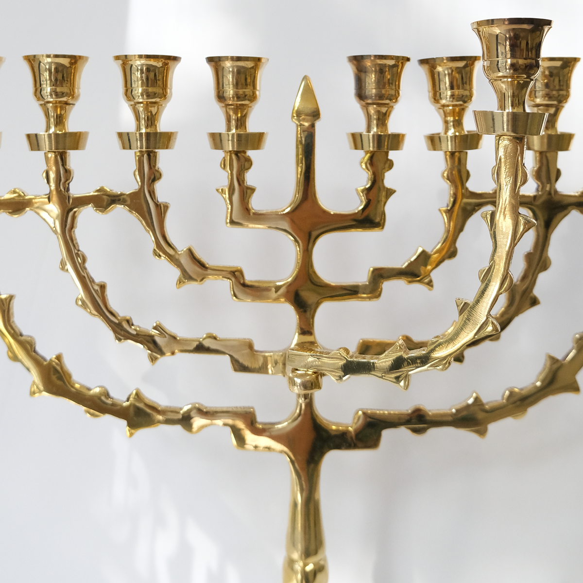 חנוכיה עם שמש מסתובב | נחושת