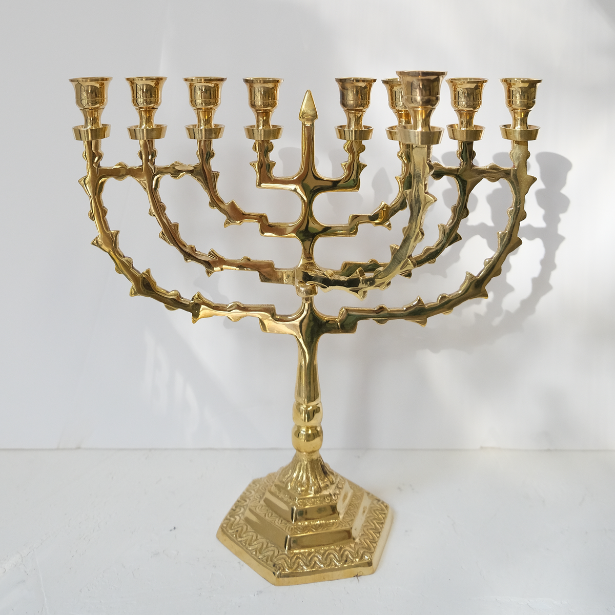 חנוכיה עם שמש מסתובב | נחושת