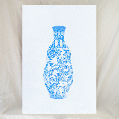 Delicate screen print of botanical vase with flowers, butterflies, snakes, and parrots in light blue on light paper